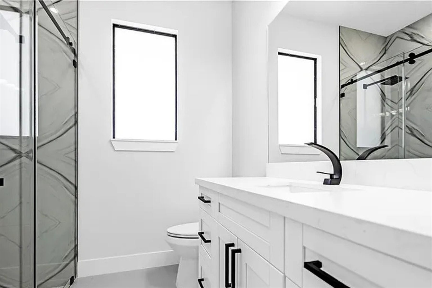 Modern bathroom vanity and glass shower